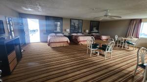 4 Double Beds, Studio Suite, Non-Smoking. room in Super 8 by Wyndham Centerville-Richmond
