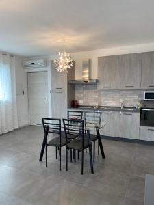 Marali Lake Apartments di ENRICA BIANCHERA