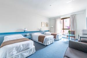 Standard Triple Studio room in Espahotel Plaza de España