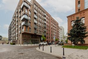 Okrzei 8 - Apartment with 2 balconies by Renters