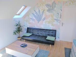 Appartements SOUS LES TOITS : photos des chambres