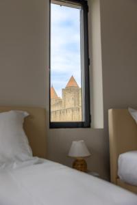 Villas Sous les remparts la maison Pimprenelle : photos des chambres