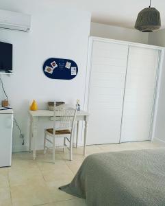 Maisons d'hotes Les Palmiers : photos des chambres