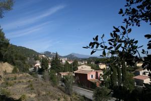 Sejours chez l'habitant AU BONHEUR, climatisation, cuisine, Piscine : photos des chambres