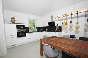 Villa Playa mit Sauna- und Schwimmbadnutzung im AHOI Sellin