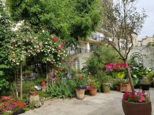 Villas Maison avec jardin a 15 mn de la Tour Eiffel : photos des chambres