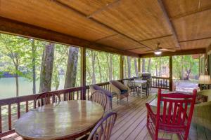 Roomy Riverfront Trout Valley Cabin with Porch!