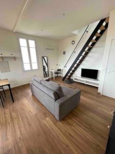 Appartements Duplex au calme en maison : photos des chambres