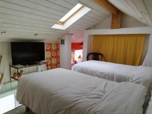 B&B / Chambres d'hotes Chalet de Paris : photos des chambres