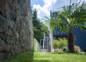 Appartements Ty Puns - Gite ecoresponsable dans un espace verdoyant en centre-ville : photos des chambres