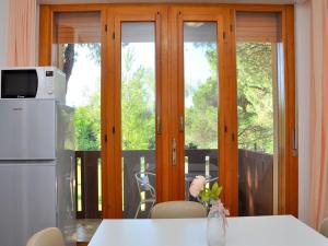 Comfy flat with terrace next to the beach-Beahost - 4hvězdičkové hotely ve městě Bibione