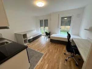 1 Zimmer Studioapartment mit bis zu 2 Einzelbetten in der Land of Living - Obersaal