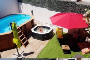 Maisons de vacances Maison de ville avec piscine : photos des chambres