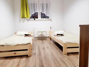 Apartamenty pod lasem