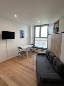 Appartements Nouveau - Vivez l'Horizon sur la mer - plage : photos des chambres