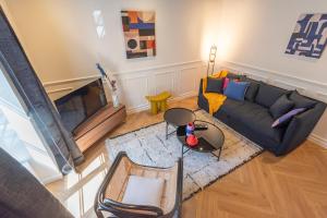 Appartements Le Cosy Chic . Proche gare . Centre-ville Macon . Neuf . Climatisation . Design . Wifi . : photos des chambres