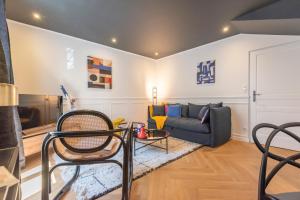 Appartements Le Cosy Chic . Proche gare . Centre-ville Macon . Neuf . Climatisation . Design . Wifi . : photos des chambres