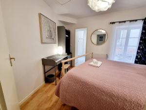 Appartements Coquette maison de ville calme avec patio : photos des chambres