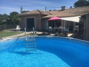 Maisons de vacances Maison familiale au calme avec piscine : photos des chambres