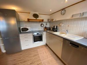 Direkt am Hopfensee- Ferienwohnung