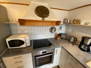 Direkt am Hopfensee- Ferienwohnung