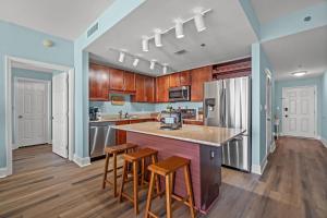 Deja Blue at Laketown Wharf #1831 by Nautical Properties