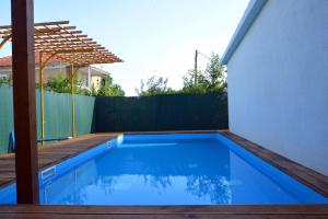 Apartment Lucy by the sea with a private pool