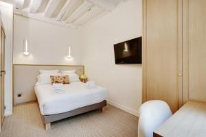 Appartements Pick A Flat's Apartments in Louvre - Rue Saint Honore : photos des chambres