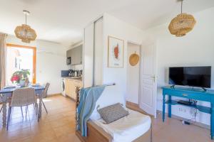 Appartements Capra Scorsa - Appt vue mer et piscine partagee : photos des chambres