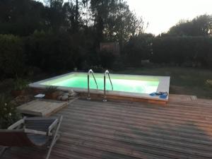 Villas Maison en bois avec piscine a 1000 m des plages. : photos des chambres