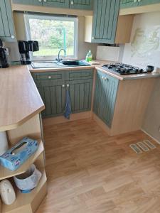 Campings Mobil-home dans camping calme : photos des chambres