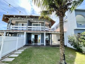 148 - Casa pé na areia Mariscal com 04 dormitórios