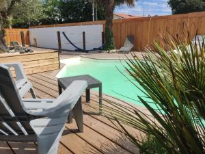 Chalets cottage la dune les cigales du bassin a Gujan-Mestras : photos des chambres