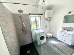 Appartements La Lande - Petite maison avec jardin : photos des chambres