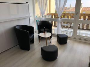 studio - balcon plein sud - parking - centre port