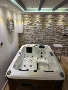 Maisons de vacances Agreable Maison avec jacuzzi : photos des chambres