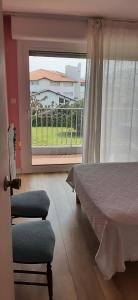 Appartements Cosy : photos des chambres