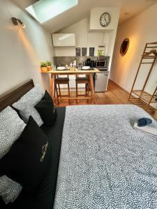 Appartements Studio Cozy Hypercentre 12 min de Paris : photos des chambres