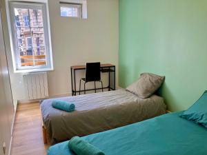 Appartements Le Cosy - T3 Familial - Calme - Centre ville - Netflix - Wifi : photos des chambres