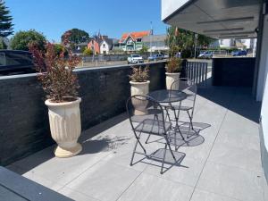 Appartements LARMOR-PLAGE : T2 en residence de standing avec terrasse et parking, a deux pas de la plage et des commerces - FR-1-349-182 : photos des chambres