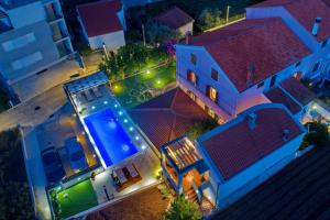 Family friendly apartments with a swimming pool Preko, Ugljan - 20390