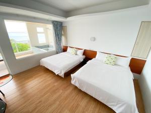 Phòng 4 Người Nhìn Ra Biển (Quadruple Room with Sea View)