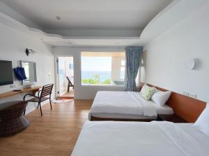 Phòng 4 Người Nhìn Ra Biển (Quadruple Room with Sea View)