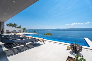 NEW! Villa Admira Maria with a heated pool and sea views