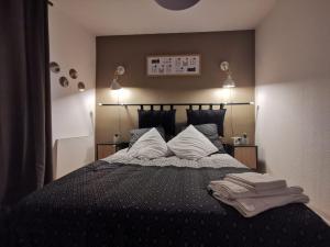 Appartements LE COSY - Appartement Pontoise Cosy Calme : photos des chambres
