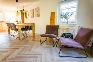 Vakantiehuis in het bos met jacuzzi en sauna