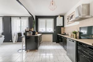 Appartements Le City Center spacieux et chic : photos des chambres