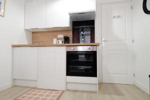 Appartements Au detour du Beffroi : photos des chambres