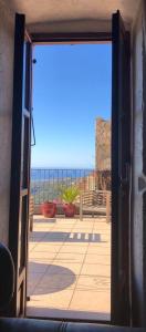 Appartements Corse Balagne Cateri au dessus de Corbara - Logement Maison de Charme 80m2 -Terrasse vue inoubliable 40m2 - 4 personnes - Coup de coeur assure : Appartement 2 Chambres