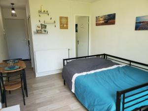 Appartements Appartement avec jardin privatif : photos des chambres